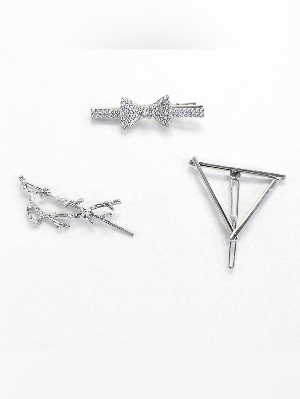 VINTAGE SILVER HAIR CLIPS.